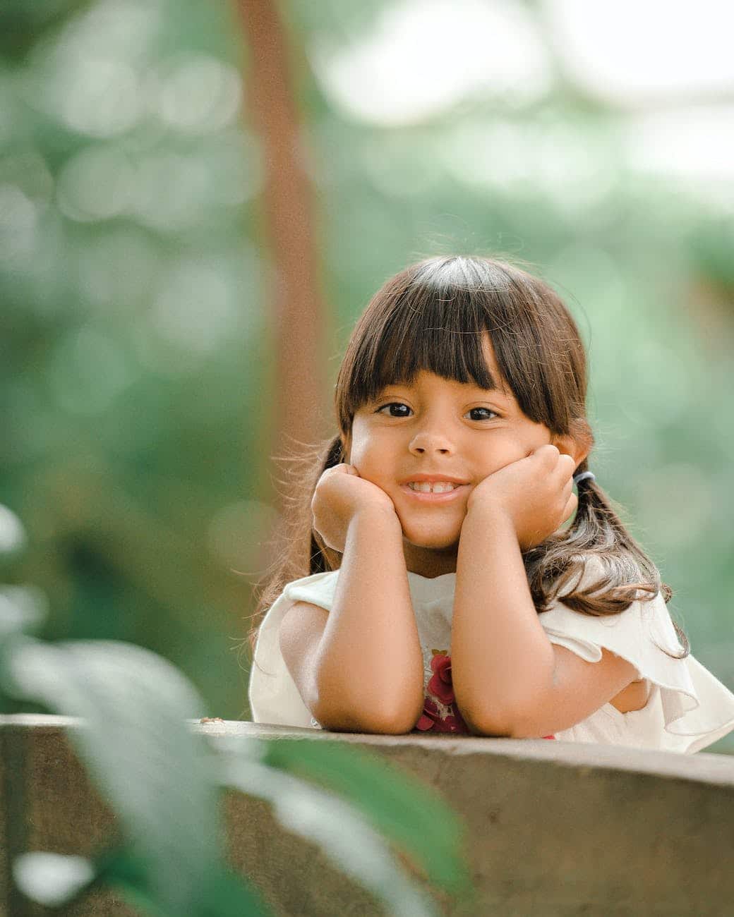 Tu guía en Tailandia: niña tailandesa sonriendo